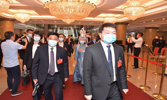Zhejiang delegates travel to Beijing for two sessions